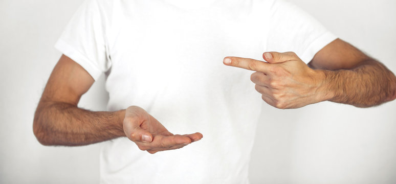 Man pointing to his empty cupped hand