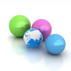 Pilates fitness ball and earth