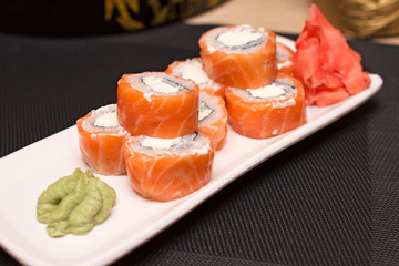 Philadelphia roll on a white plate