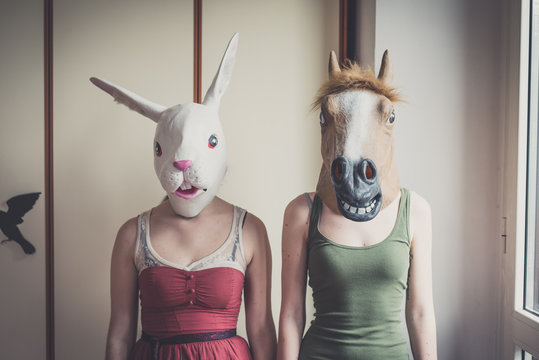 mask rabbit and horse mask lesbian couple