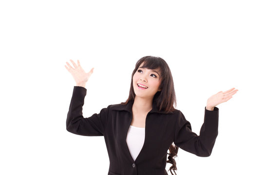 exited, surprised business woman looking up to blank space