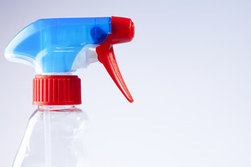 Blue/Red spray bottle nozzle close-up