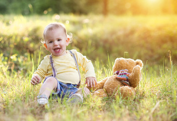 Little boy having fun on a meadow