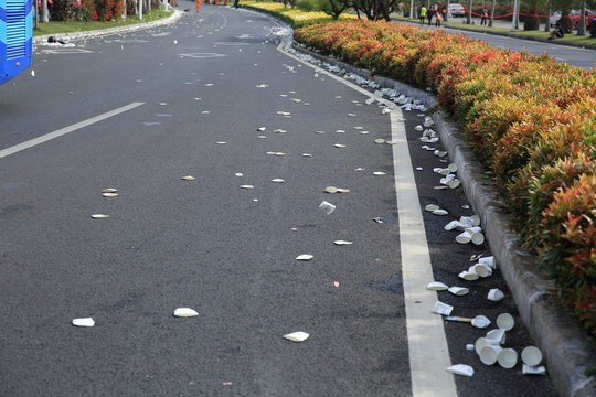  Clearner Cleaning The Used Water Paper Cup After Marathon Runni