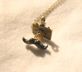 Necklace of the astonishment mustache camera