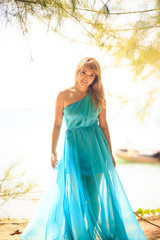 young happy asian girl on island