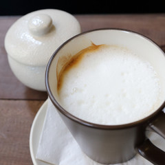 hot coffee latte on wood table