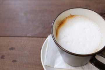 hot coffee latte on wood table