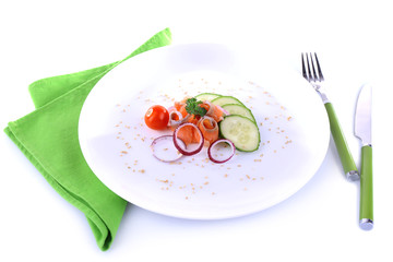 Appetizing fish salad with vegetables on plate isolated on