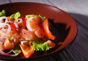 Fresh fish salad with vegetables