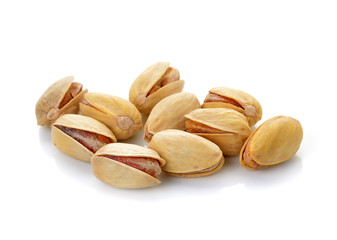 toasted pistachios on a white background