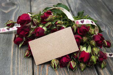 Red roses  and greeting card