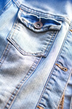 Light blue jeans jacket close up