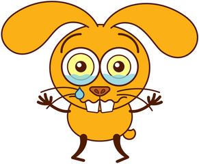 Cute yellow bunny crying and feeling sad
