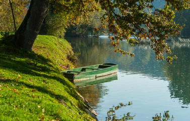 Lonely boat by Krka river, Otocec, Slovenia