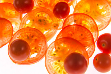backlit sliced red tomatoes