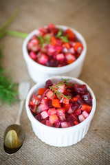 salad of boiled vegetables with beetroot and dill