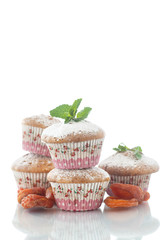 sweet muffins with dried apricots and sugar