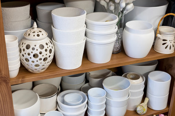 white planters in the florist shop