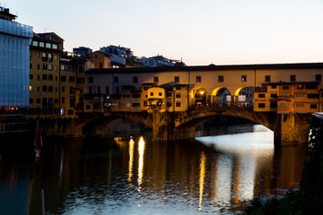 sunset on ponte vecchio, florence, italy