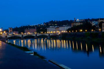 carraia bridge by night, florence, italy