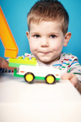 Boy with toy car