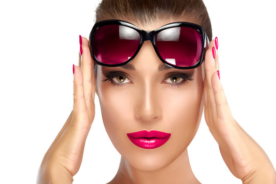 Fashion Model Woman Holding her Shades on Forehead