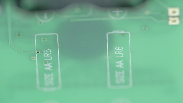 The green micro chip of the battery
