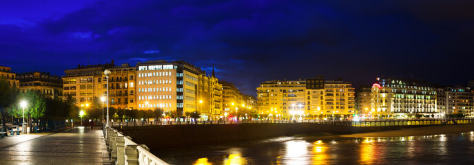 Fototapeta na wymiar Panorama of Bay of La Concha in night. San Sebastian, Spain