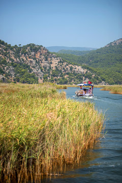 TURKEY, DALYAN, MUGLA - JULY 19, 2014: Touristic River Boats wit