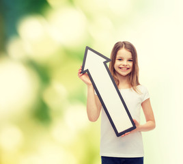 smiling little girl with blank arrow pointing up