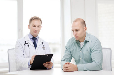 doctor with clipboard and patient in hospital