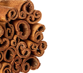 Cinnamon sticks on white
