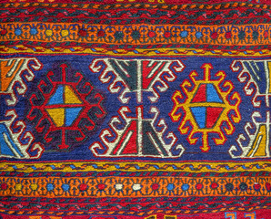 Colorful peruvian fabric style rug surface close up - 76075480
