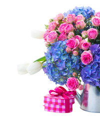pink roses and blue hortensia flowers close up