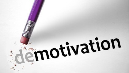 Eraser changing the word Demotivation for Motivation