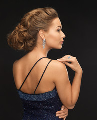 woman with diamond earrings