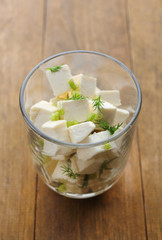 Feta cheese on table