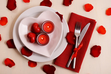 Festive table setting for Valentines Day on light background