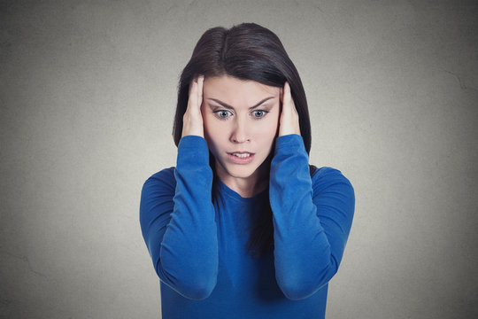 stressed sad young housewife woman having migraine, tensed