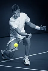 Deurstickers Young man playing tennis © Mikael Damkier