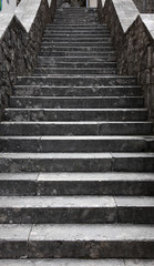 Fototapeta na wymiar Stairs in the old town of Kotor on Adriatic coast of Montenegro.