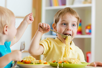 kids eating in kindergarten