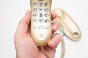 Home handset with buttons in hand