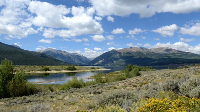 Timelapse clouds and mountain scene, Rocky Mountains