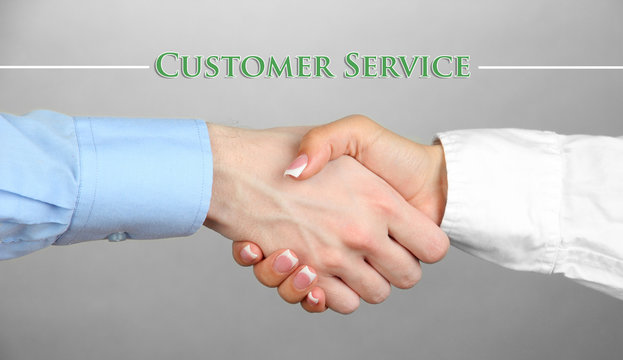 Business handshake symbolizing support and customer service