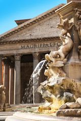 Fountain and the Pantheon in Rome, Italy. Closeup