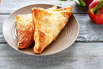 Charlotte with apples on wooden boards
