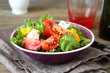 Fresh tasty salad with vegetables and feta