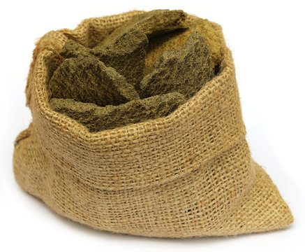 Mustard oil cake in a sack bag